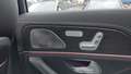 View of control buttons for electric rear seat adjustment
