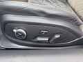 View of control buttons for electric seat adjustment