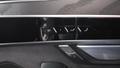 View of control buttons for electric rear seat adjustment