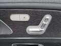 View of control buttons for electric rear seat adjustment