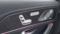 View of control buttons for electric rear seat adjustment